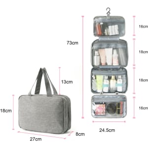 A grey large capacity hanging toiletry bag with multiple transparent compartments for toiletries and a hook for hanging.
