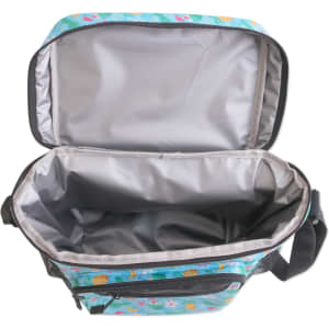 A cooler bag with a colourful exterior featuring patterns, equipped with a strap and a silver-lined interior.