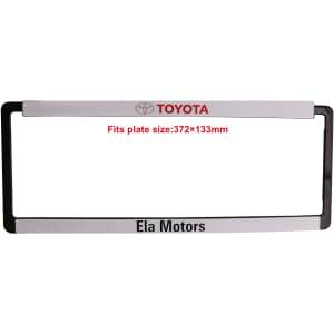 A plastic licence plate frame in black and silver, featuring a logo and space for plate size.