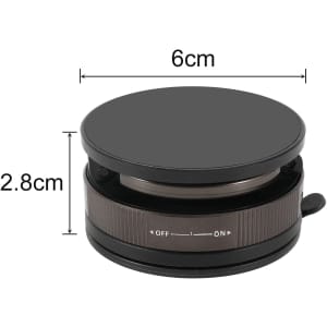 A round, black suction magnetic phone holder with dimensions 6cm in diameter and 2.8cm in height.