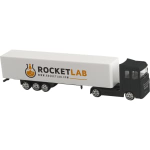 A truck toy model in black and white, featuring a logo on the trailer.