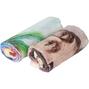 Two rolled-up beach towels, one featuring a colourful pattern and the other a design resembling banknotes. Each towel has a logo.