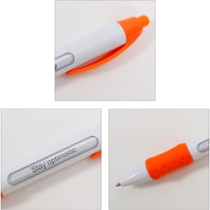 A white pen with an orange clip and grip, featuring a transparent panel with a motivational message.