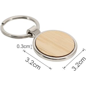 A round wooden keyring with a silver metal ring, featuring a natural wood surface. Dimensions are 3.2 cm by 0.3 cm.