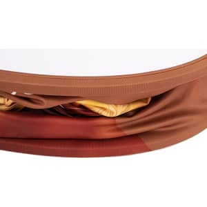A backlit LED spring-up display with a rectangular shape, featuring a brown and orange fabric graphic.