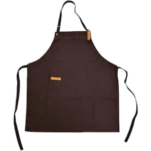 A black poly-cotton canvas full bib apron with neck strap and a front pocket, featuring a logo.