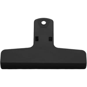 A black plastic magnetic clip with a wide grip and a hole for hanging. It features a simple, functional design.