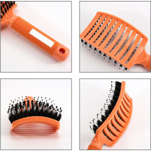 An orange detangler bristle hairbrush with a textured handle and flexible bristles, shown from multiple angles.
