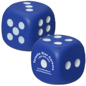A blue dice-shaped stress reliever with white dots, featuring a logo on one side.