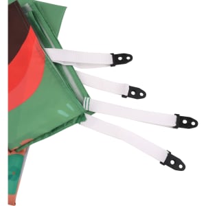 An outdoor blanket featuring a vibrant design in green and red, with attachment straps along the edges.
