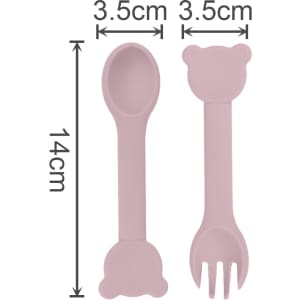 Bear-shaped silicone cutlery for kids in soft pink, featuring a spoon and fork with rounded bear heads.