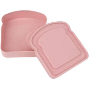 A pink portable bamboo fibre lunch box with a sandwich-shaped design, featuring a lid that fits snugly on top.