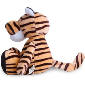 A plush tiger toy in orange and black stripes, featuring a soft texture and a small tail. It has a logo on the bottom.