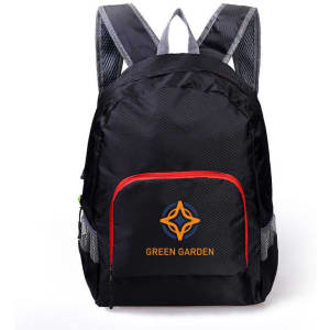 A black backpack with a red zipper pocket and a logo on the front. The straps are grey.