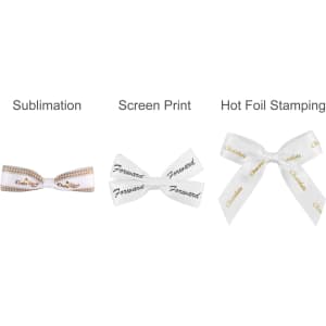 Three hair clip bows in various designs: a brown checkered bow, a white bow with black text, and a glossy white bow with gold lettering.