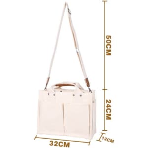 A cream canvas tote bag with adjustable straps, featuring multiple pockets and a sturdy handle for easy carrying.