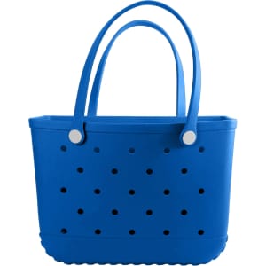 A blue EVA beach bag with perforated holes and two sturdy handles. It features a simple, stylish design.
