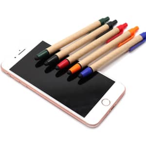 A collection of stylus pens in red, blue, green, and black lined up against a smartphone screen. Each pen has a paper barrel and a touch head.