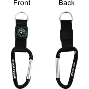 A black carabiner keychain featuring a compass and a sturdy strap. The keychain has a logo on one side.