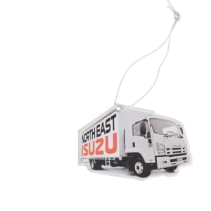 A custom car air freshener shaped like a truck, predominantly white with a graphic and string for hanging.