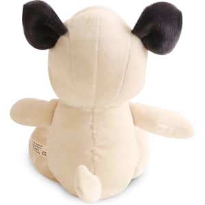 A beige plush dog toy with black ears, featuring a soft, rounded body and a small tail. It has a branding logo on the back.