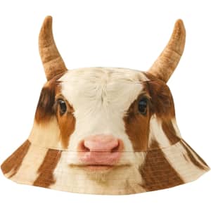 A bucket hat featuring a cow print design with animal ears, in brown and white colours.