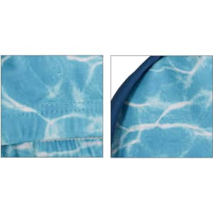 A swimming cap in blue with a water pattern, featuring stitching details and a contrasting edge. It has a logo.