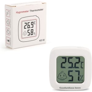 A white digital thermometer with a large display showing temperature and humidity, alongside its packaging.