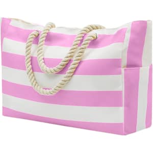 A pink and white striped beach bag with a rope handle and side pocket, featuring a logo.