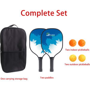 A wooden pickleball set featuring two paddles in blue and black, accompanied by a carrying bag and four pickleballs.