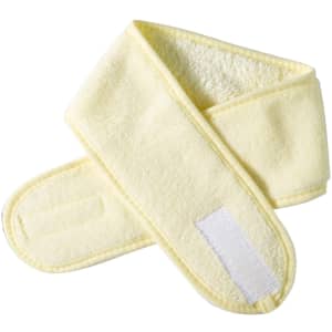 A yellow promotional headband made of soft fabric, featuring a logo and a Velcro closure.