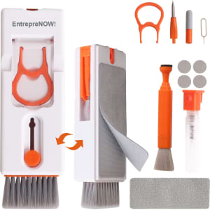 An 11-in-1 cleaning kit in white and orange, including brushes, a spray bottle, and various cleaning accessories.