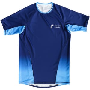 A blue and light blue crew neck raglan tee shirt made of 100% polyester micro mesh, featuring a logo.