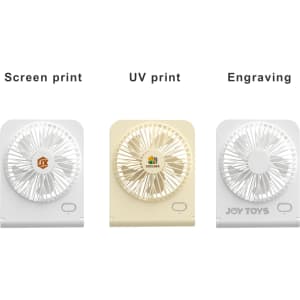 A collection of three mini desk fans in white and cream, featuring different printing options on the front.