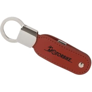 A leather swivel flash drive in brown with a keyring attachment and a logo on one side.