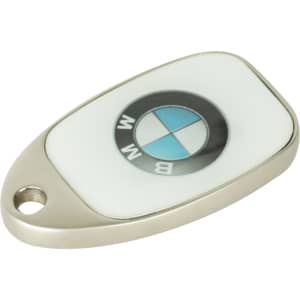 A silver sliding epoxy doming flash drive with a white and black logo featuring a blue circle design.