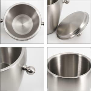 A stainless steel ice bucket with a smooth finish and a round lid, featuring a decorative knob on the side.