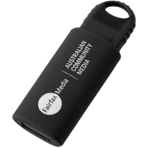 A black flash drive with a keychain loop and a logo on its surface. Compact and portable for data storage.
