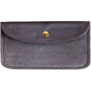 A grey velvet glasses pouch featuring a snap closure and a gold-toned stud.