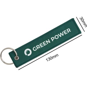 A green woven key tag featuring a ring for attachment and a logo, measuring 130mm by 30mm.