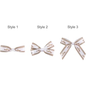 Three hair clip bows in white and brown patterns, featuring different styles with varying ribbon arrangements.