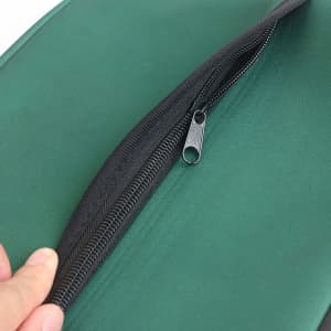 A green laptop bag featuring a smooth zipper, showcasing a close-up of the zipper area.
