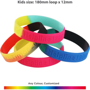 Four silicon wristbands in vibrant colours: pink, blue, green, and black, featuring a logo. Kids' size displayed.