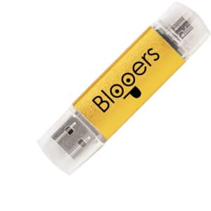 A gold and clear double-end flash drive with a logo on its casing.