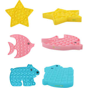 Various fidget toys in bright colours including a yellow star, pink fish, blue bear, and green whale shapes.