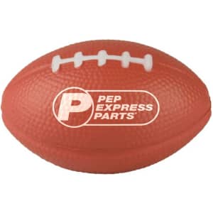 An orange rugby-shaped stress reliever with white detailing and a logo.