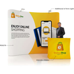 A curved tension fabric display wall featuring a yellow and white design, with a product image and a figure beside it.