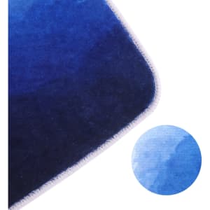 A flannel logo mat featuring a gradient of deep blue tones, with a close-up of its texture and stitching.
