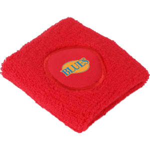 A red Terry Sport Wristband featuring a circular logo. The wristband has a soft, textured fabric.