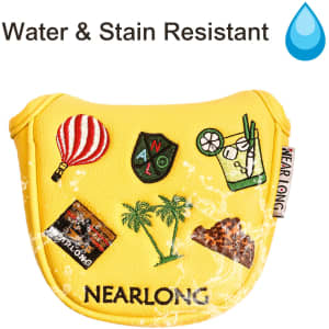 A yellow mallet putter cover featuring various embroidered patches and a logo, designed to be water and stain resistant.